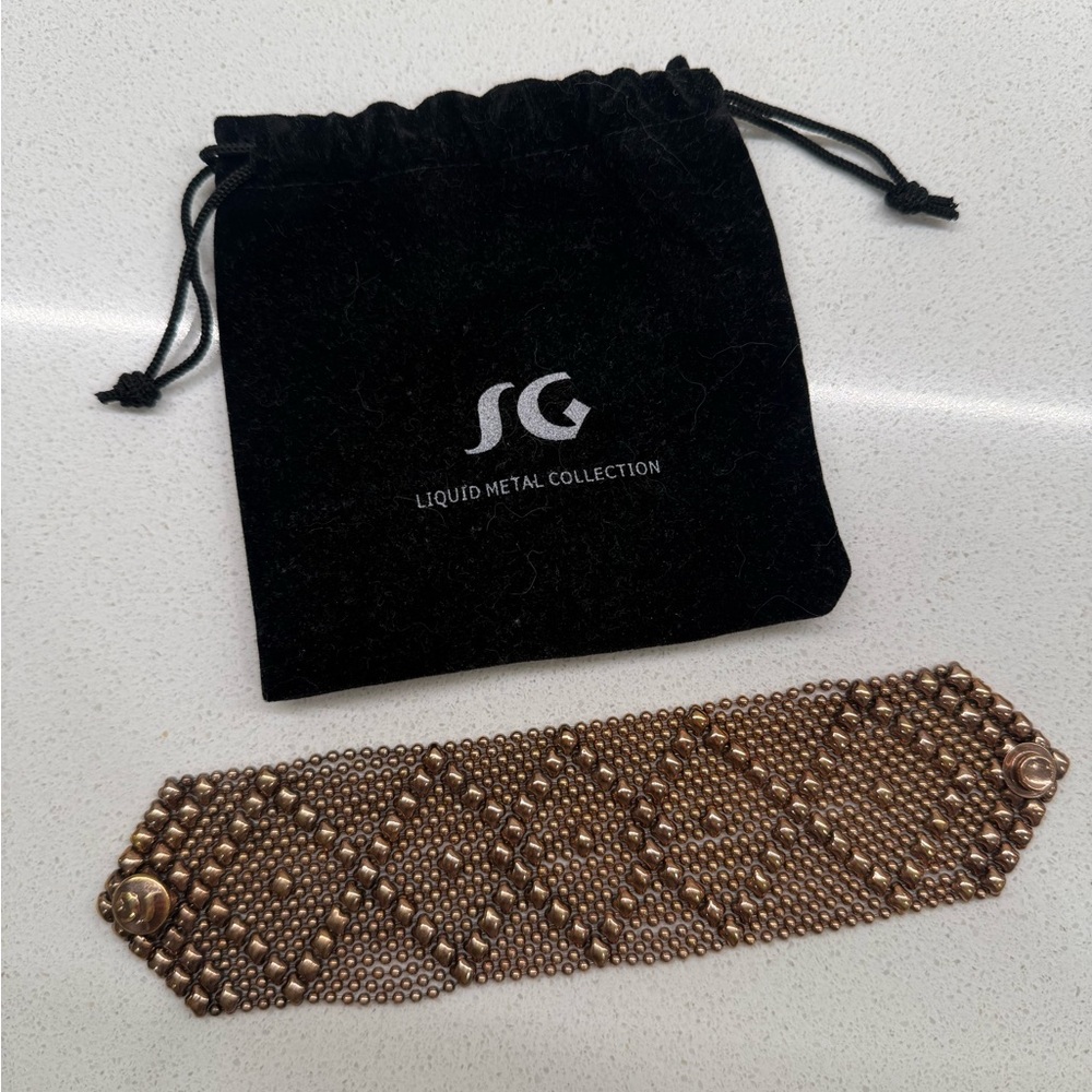 SG LIQUID METAL ROSE GOLD FINISH BRACELET BY SERGIO GUTIERREZ